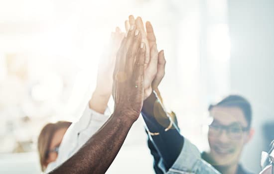 Diverse team of people together in an office