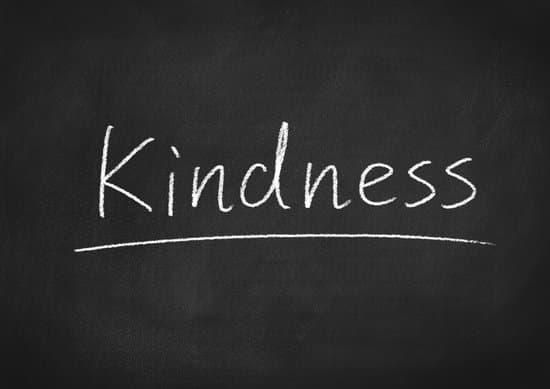 kindness concept word on a chalkboard background