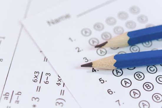 Pencil on answer sheets or Standardized test form with answers bubbled. multiple choice answer sheet