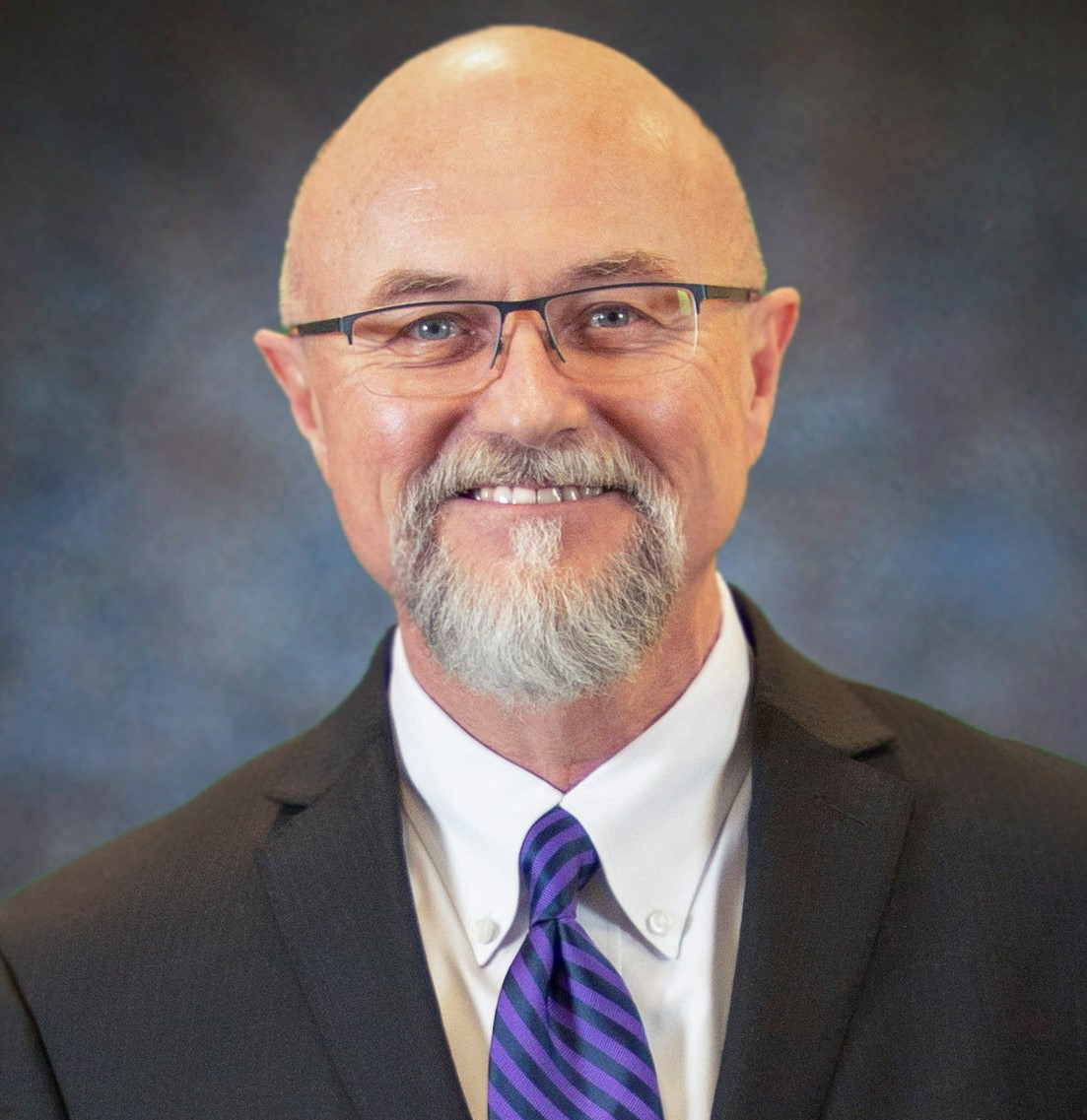 Dr. Ric Neal Baser