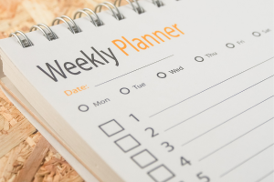 Have a well-organized dailyweekly planner. - Image