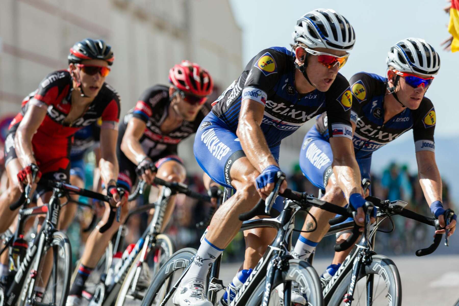 Several cyclists racing in a competitive race